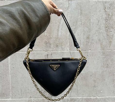 prada triangle bag double|Prada symbole bag.